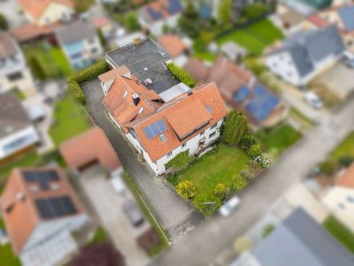Viel Platz für Familie und Beruf! Zweifamilienhaus mit angrenzender Werkstatt und Lager