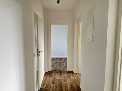 Ganz oben ankommen - Sanierte 3-Raum-Wohnung mit Balkonblick zur Mulde