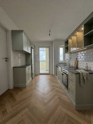 Lichtdurchflutete Galeriewohnung mit Dachterrasse und Aufzug