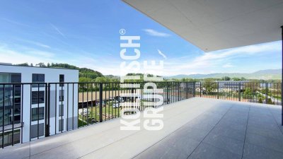 Exklusive 4-Zimmer-Wohnung mit großzügiger Dachterrasse &amp; zwei TG-Stellplätzen in Feschnig.