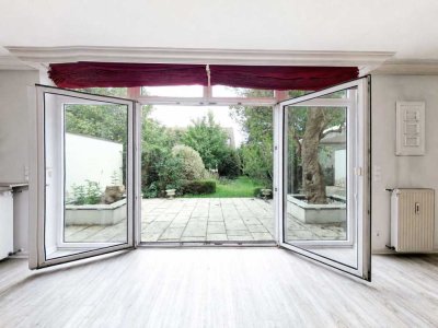 Urbanes Garten-Loft mit Hausgefühl – außergewöhnlicher Wohnbereich, große Terrasse & über 200