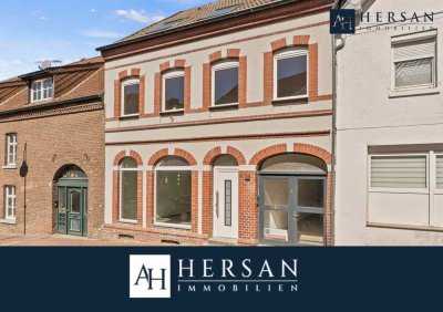 Teilsaniertes Mehrfamilienhaus mit Ladenlokal und Innenhof im Herzen von Wasserberg!