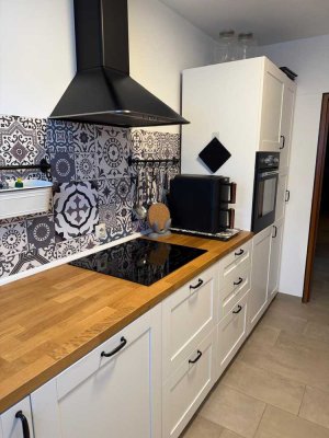 Exklusive 3,5-Raum-Erdgeschosswohnung mit geh. Innenausstattung, sep. Tiefgarage + Stellplatz aussen
