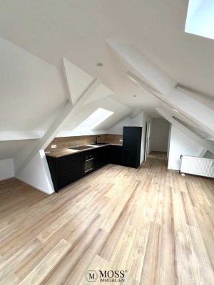Stilvolles Wohnen im Dachgeschoss: Modernes, klimatisiertes Apartment mit Einbauküche zu vermieten!