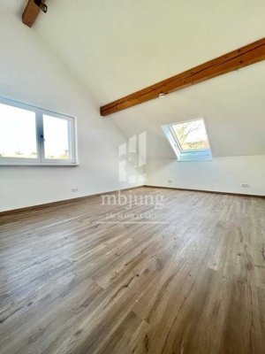 ** Dachgeschosswohnung in zentraler und ruhiger Lage **