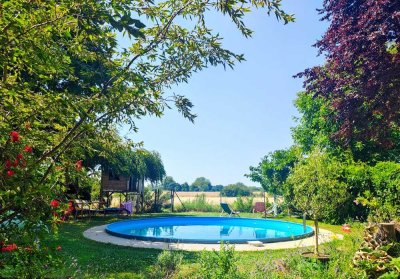 Zweifamilienhaus mit traumhaftem Ausblick, Pool & modernster Ausstattung in ruhiger Sackgassenlage!