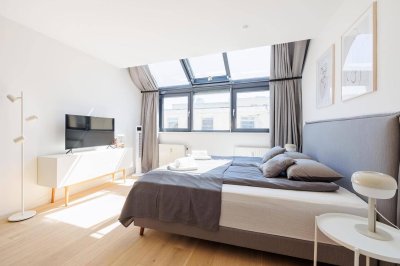 Moderne Dachgeschosswohnung inkl. Garagenplatz – attraktiv vermietet bis 01.02.2030