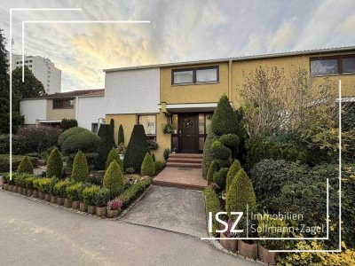 Charmantes Reihenhaus mit Wintergarten und Tiefgaragenstellplatz in familienfreundlicher Lage!