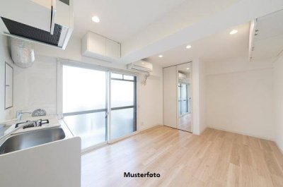 Attraktive Wohnung im EG mit offener Küche, Balkon und Tiefgarage