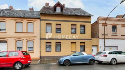 Investieren und Gestalten: Zweifamilienhaus mit Entwicklungsmöglichkeiten