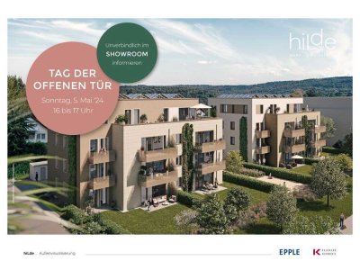 Kleine Hausgemeinschaft: moderne 4-Zimmer-Wohnung mit zwei Bädern & Balkon zum Quartierspark.