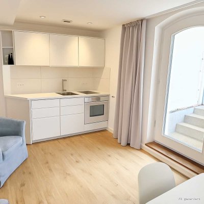 Sanierte und voll-möblierte 2-Zimmer-Gartenwohnung an der Festspielauffahrt