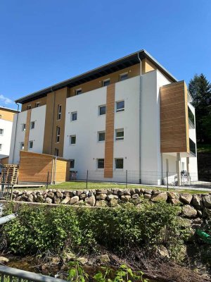 Erstbezug in energieeffizientem QNG40-Haus: Stilvolle 2-Zimmer-Erdgeschosswohnung