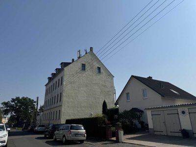 Teilsanierte 3-Zimmer-Wohnung mit Südbalkon & Einbauküche