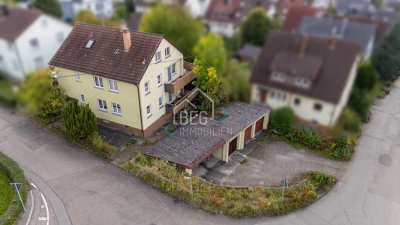 Großzügiges Zweifamilienhaus mit Garten, Garagen und viel Gestaltungspotenzial