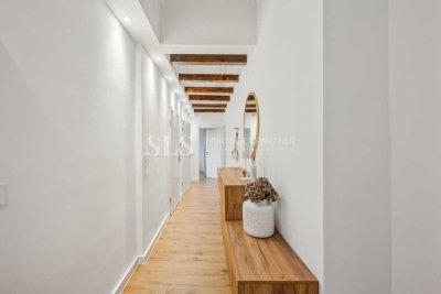 Vermietete Dachgeschosswohnung im kernsanierten Mehrfamilienhaus
