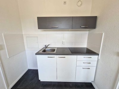 1-Zimmer-Wohnung im 1. Obergeschoss mit Einbauküche zu vermieten