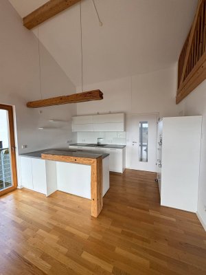 Offene 3-Zimmer Neubauwohnung mit Balkon und Carport
