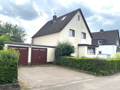 Freistehendes 1 -2 Familienhaus mit Anbaupotential!
