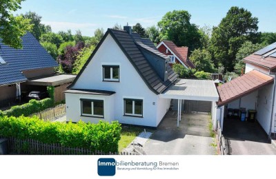 Modernisiertes Einfamilienhaus mit Garten und Carport