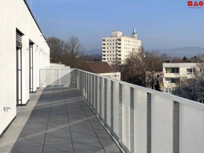 Dachterrassenwohnung mit zeitloser Architektur und klaren Raumkonzept laden zum Leben ein: Profitieren Sie von der umweltbewussten Heiz- und Kühltechnik