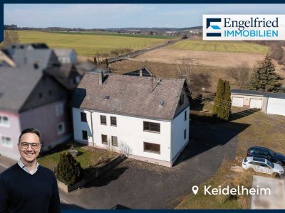 Geräumiges Ein- bis Zweifamilienhaus mit drei Garagen auf großem Grundstück nahe Simmern