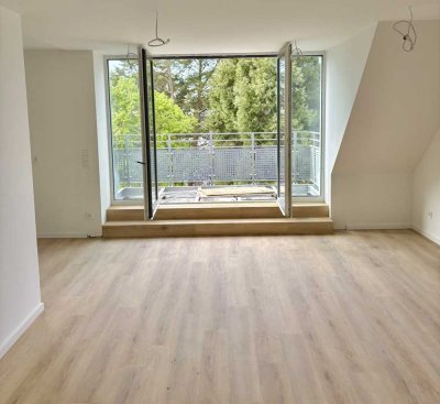 Erstbezug!  Helle 3-Zimmer-Wohnung mit Dachterrasse und Einbauküche