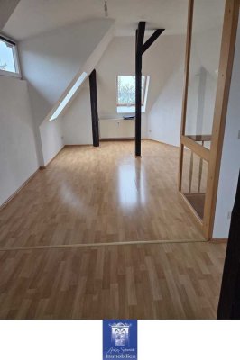 Traumhafte Dachgeschosswohnung in stilvoller Stadtvilla mit herrlichem Fernblick!
