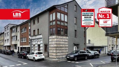 Mehrfamilienhaus mit 4 Wohneinheiten, Gewerbeeinheit und 3 Stellplätzen