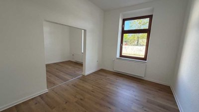 Renovierte 4-Zimmer-Wohnung mit Gemeinschaftsgarten