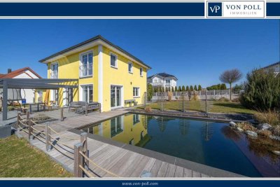 Exklusives Einfamilienhaus mit Naturpool und Doppelgarage in ruhiger Lage