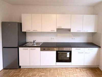 Erstbezug: 2 ZIMMER-Neubau, ruhiger Süd-Balkon 7,5m², Wohnküche, neue Sanitäranlagen, Lift, TG-Platz