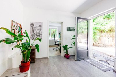 Teilsaniertes Einfamilienhaus mit Baureserve und großem Naturgarten-nahe dem historischen Stadtkern