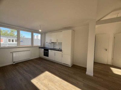 Erstbezug nach Sanierung. Top ausgestattete DG-Wohnung in typisch norddeutschem Rotklinker.
