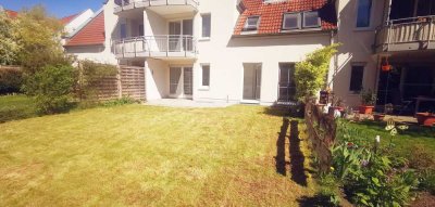 Grünes Wohnidyll: 2-Zimmer-Wohnung mit Terrasse, Privatgarten & TG-Stellplatz