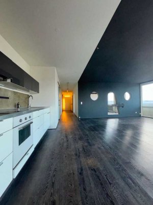 Perfekte Lage, perfekter Blick – Moderne Wohnung mit Tiefgaragenplatz und Teilmöblierung