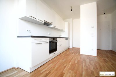 Beeindruckend aufgeteilte 3 - Zimmer Dachgeschoss Wohnung mit Dachterrasse &amp; EWE Einbauküche inkl. Geräte - optional Garagenstellplatz verfügbar