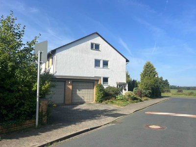 Möblierte 4-Zimmer-Wohnung mit eigenem Garten in 2-Familienhaus