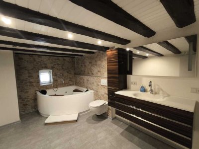 Einfamilienhaus mit Carport, Schuppen und Baumgrundstück mit Zugang zur Sulzbach!