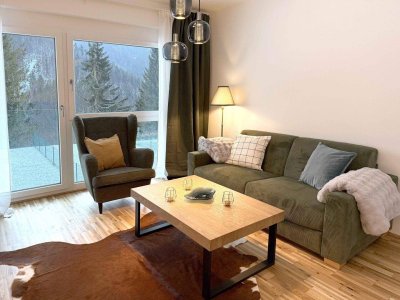 08 – Alpine Eleganz auf zwei Ebenen – Garten-Maisonette mit Panoramablick als Zweitwohnsitz