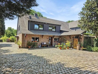 Familienfreundliche Doppelhaushälfte auf großem Grundstück im grünen Moers-Genend