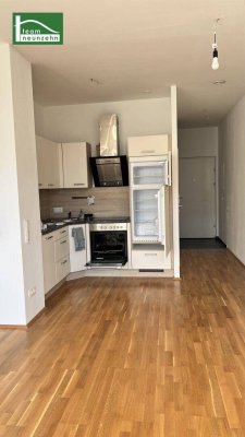 1,5-Zimmer Wohnung mit Gartenterrasse in generalsaniertem Neubau mit 11m2 Terrasse und einer tollen Raumhöhe!
