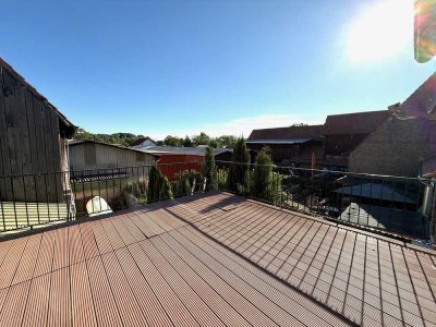 Schicke Maisonette-Wohnung mit großem Balkon in ruhiger Lage