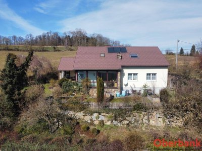 Ein- bzw. Mehrfamilienhaus mit traumhaftem Grundstück in beliebter Siedlungslage