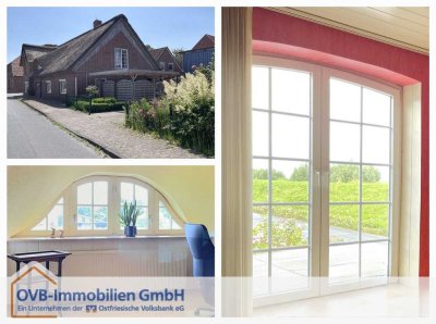 Einladendes Reetdachhaus mit Deichpanorama