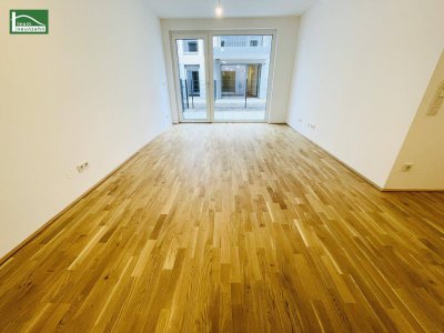 Ruhige Wohnung mit Terrasse und Garten in einer modernen Neubauanlage! Garagenplatz im Kaufpreis inkludiert! Befristet vermietet - Für Anleger und Eigennutzer!