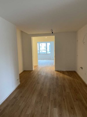 Helle und großzügige Erdgeschosswohnung mit Terrasse und Garten in Innenstadtnähe
