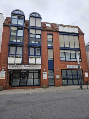 Mehrfamilienhaus mit Gewerbeeinheit in der Innenstadt