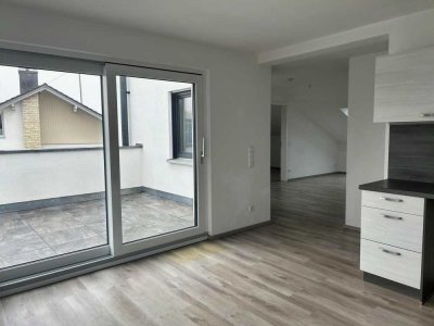 Hochwertige 2 ZKB (W6) mit EBK, Dachterrasse + PKW-Stellpl. in der Duplexgarage!