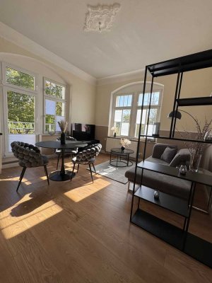 Lichtdurchflutete 2 Zimmer Wohnung in sehr exklusiver Villa
